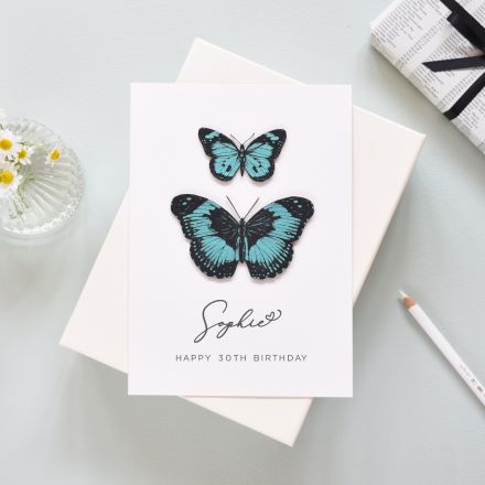 Blue handpainted and etched butterflies mounted on a Birthday day card