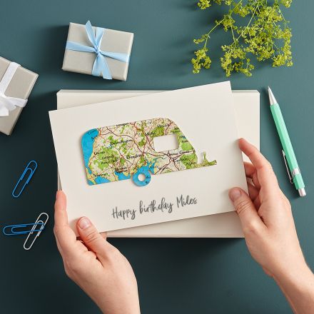 Caravan cut from map and mounted on white card printed with 'happy birthday Miles'