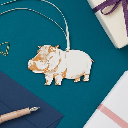 Hippo hanging keepsake strung with cream ribbon