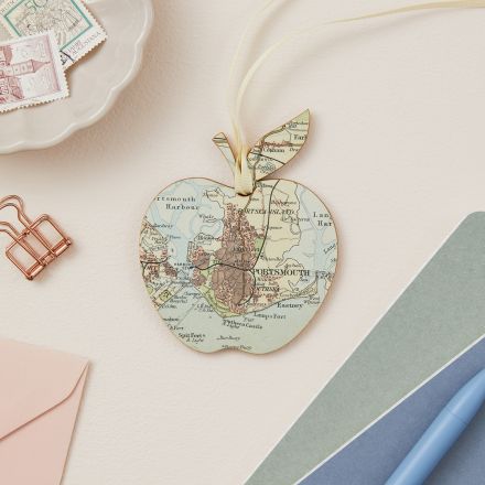 Map apple keepsake on cream ribbon