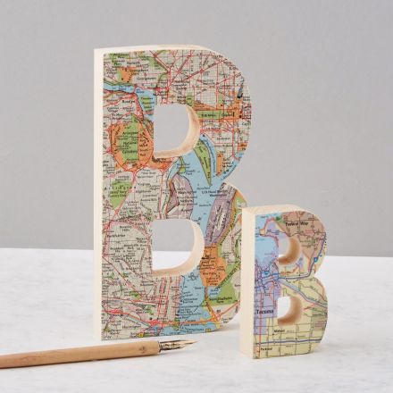 Two wooden letters featuring personalised map locations. One large 'B' one small 'B'.
