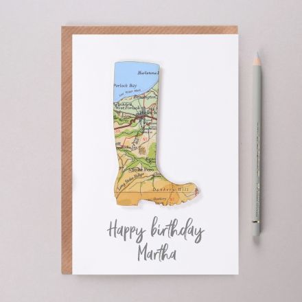 Map location welly on white card with 'Happy birthday Martha' printed beneath