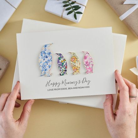 Mother's day card featuring a Mummy and three baby penguins cut from Liberty fabric.