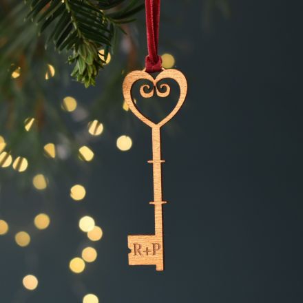 Gold painted wooden gingerbread man hanging Christmas decoration