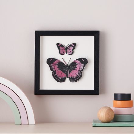 3d papercut butterflies handpainted in metallic pink. Mounted in white wood box frame.