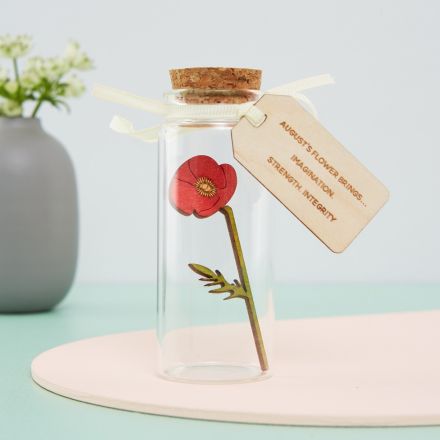 Miniature poppy in glass bottle with engraved message tag