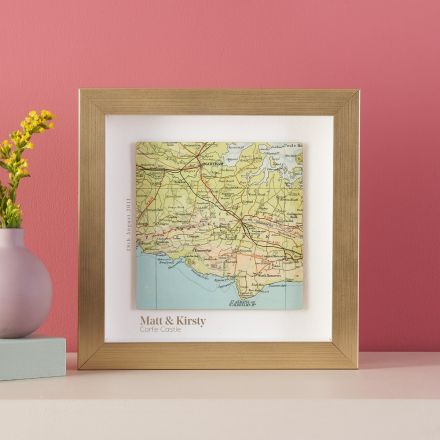 Framed map with printed personalisation and gold frame.