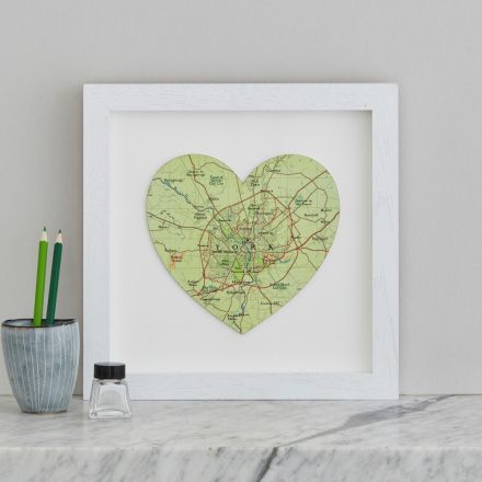 Framed map heart of York in white box frame.