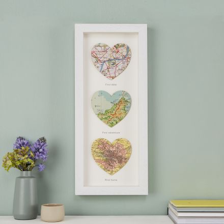 Three map hearts in a white frame, portrait orientation.