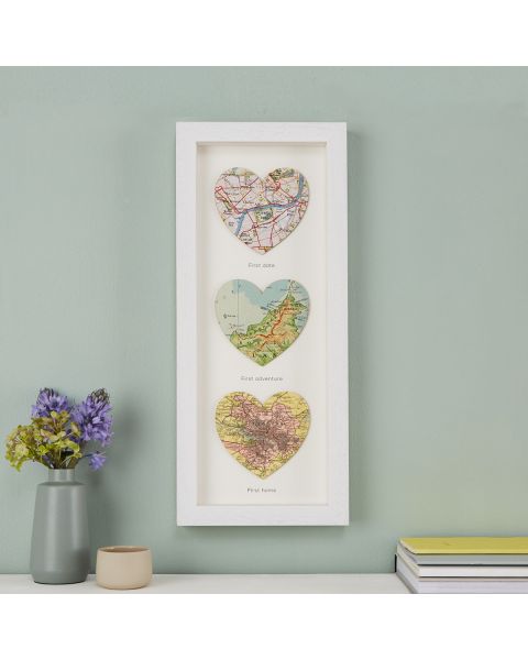 Three map hearts in a white frame, portrait orientation.