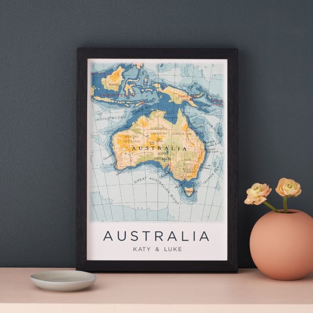 Hand-drawn map print of Australia personalised with text below map. Framed in black box frame.