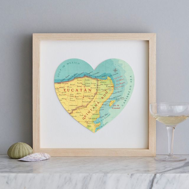 Framed map heart of Cancun, Mexico. Framed with a light wood box frame.