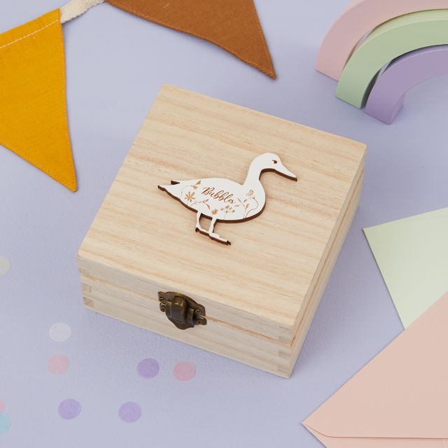 Wooden jewellery box with white duck on lid