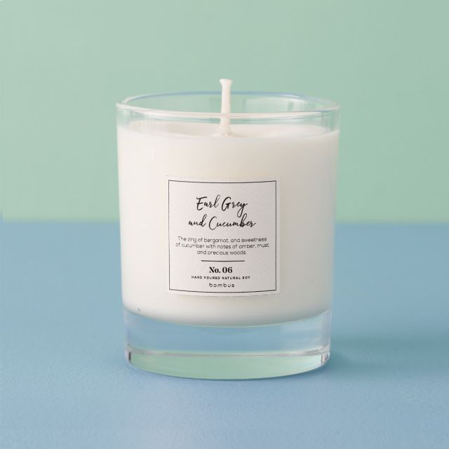 Earl grey and cucumber candle in glass jar.