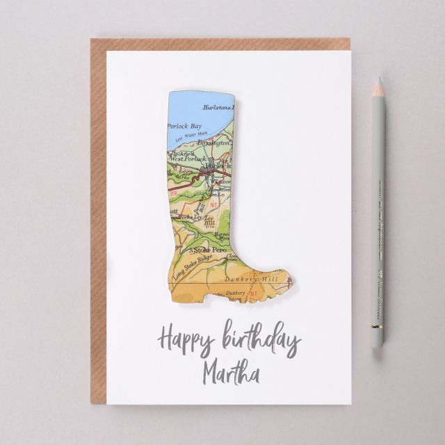 Map location welly on white card with 'Happy birthday Martha' printed beneath