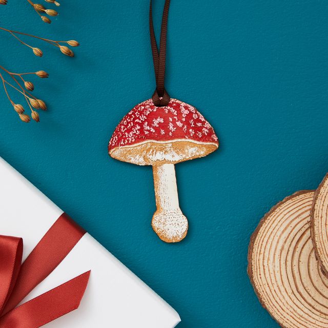 Hanging red and white mushroom decoration