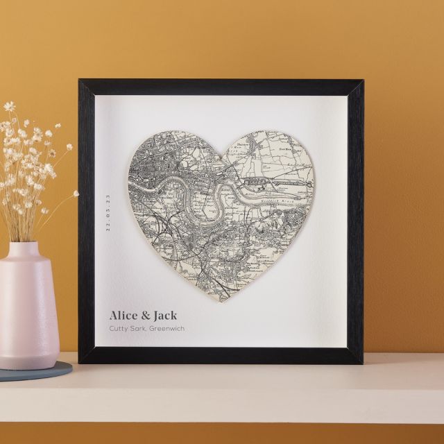 Black and white map heart on white mount in black frame
