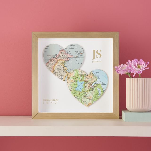 Two map hearts in gold frame with printed personalisation