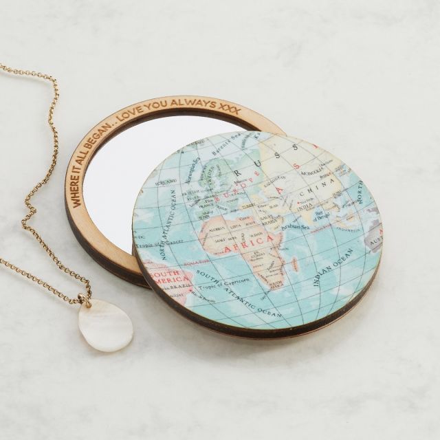 World map compact pocket mirror with 'Sophie, you mean the world to me' engraved around mirror's edge.